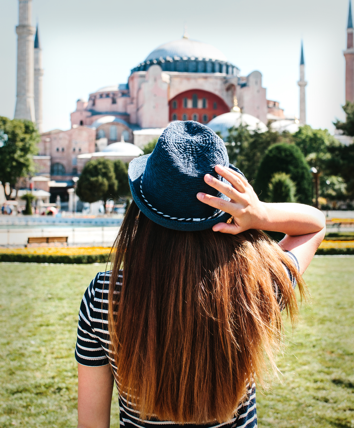 A Girl Traveler in a Hat